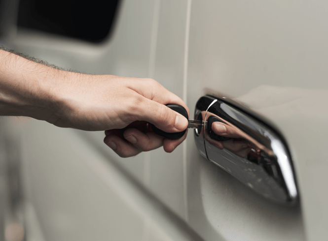 man opening a van door with his key